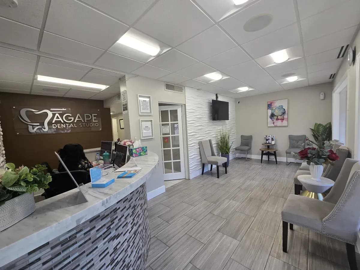 Office hallway with Agape Dental Studio signage